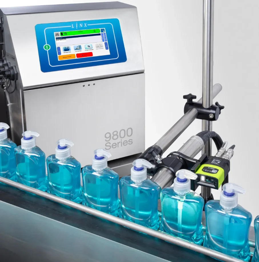 Linx continuous inkjet printer coding date and batch codes on a live production line in Pakistan